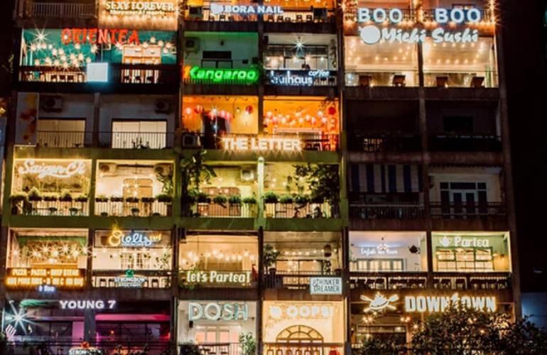 The bulding full of brand names on Nguyen Hue walking street, in Ho Chi Minh City Vietnam
