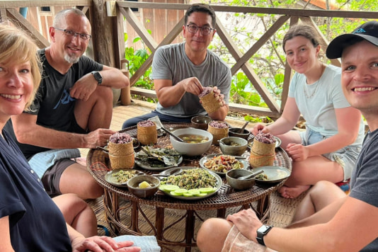 Tourists enjoy enjoying delicious dishes in Luang Prabang.
