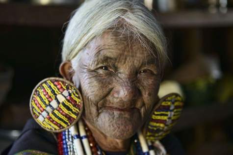 Encounter Chin ladies adorned with facial tattoos