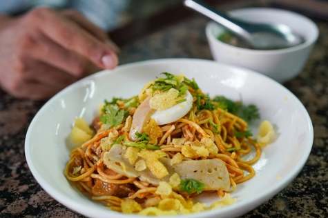 Engage in the culinary tour in Myanmar with the Inthar people, learning about their cooking techniques and savoring the flavors of their delectable dishes.