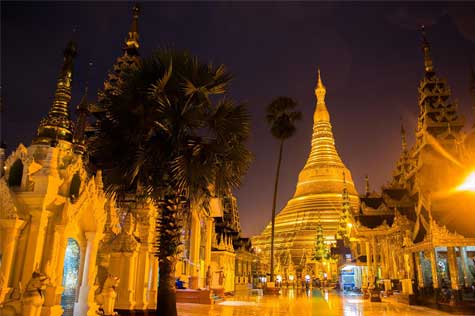 Shwedagon Pagoda shimmers in the evening.