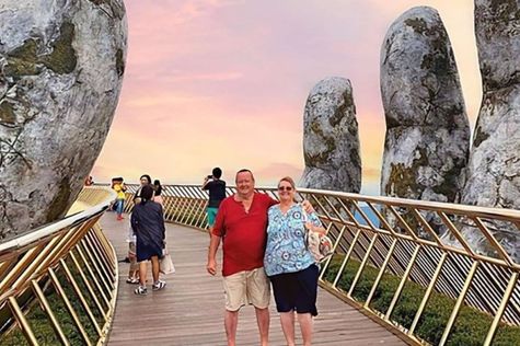 Tourists taking pictures on the Goldern Bridge in Ba Na Hills