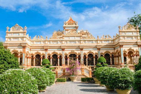 visit Vinh Trang pagoda which dates back to the late 19th century