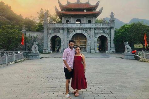 a couple taking picture in Hoa Lu, temples of King Dinh and King Le